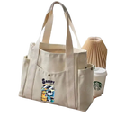 Canvas tote bag with Snoopy design.