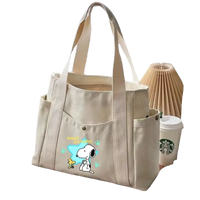 Canvas tote bag with Snoopy design.