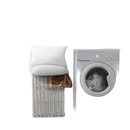 Washing machine next to laundry basket.