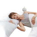 Woman sleeping with body pillow.