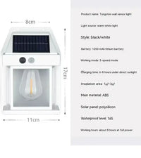 Tungsten wall sensor light with solar panel.