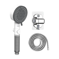 Shower head set with hose and mount.