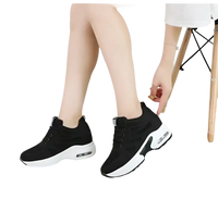 Black platform sneakers.