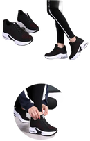 Black platform sneakers.