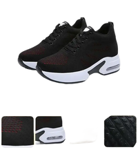 Black athletic shoes with white soles.