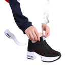 Black and red athletic shoe with white sole.