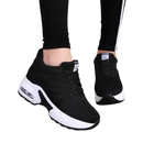 Black and white platform sneakers.