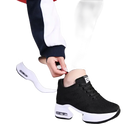 Black and white athletic shoe.