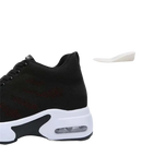 Black and white platform sneaker.