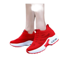 Red platform sneakers.