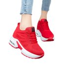 Red platform sneakers.