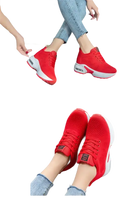 Red platform sneakers.