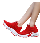 Red and white platform sneakers.