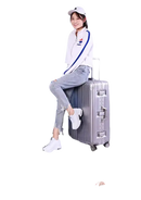 Silver rolling suitcase.