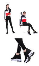 Woman’s athletic outfit with platform sneakers.