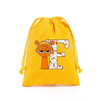 Yellow drawstring bag with cartoon character and letter E.