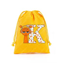 Yellow drawstring bag with cartoon character and letter K.