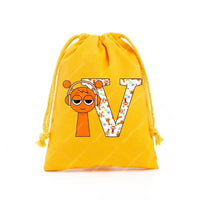 Yellow drawstring bag with cartoon design.