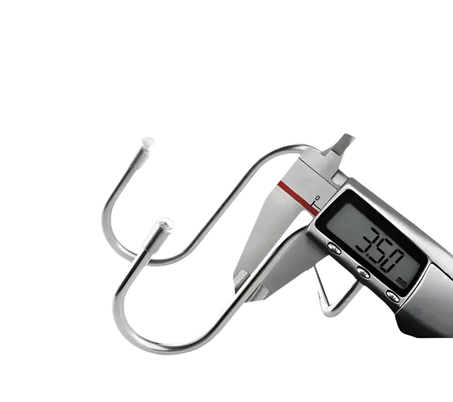 Stainless steel S-hooks being measured.