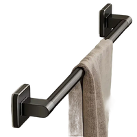 Angled metal towel bar with square mounts.
