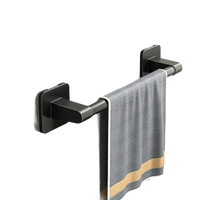 Black metal towel rack with dimensions.