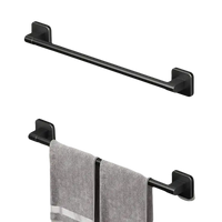 Black metal towel bars.