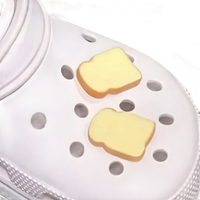 White Croc with bread charms.