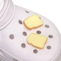 White Croc with bread charms.