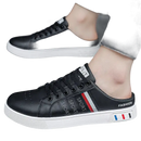 Black leather mule sneakers.