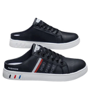 Black leather mule sneakers.