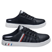 Black leather mule sneakers.