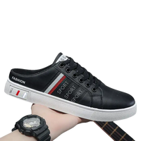 Black leather mule sneaker.
