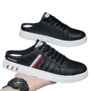 Black slip-on sneakers.