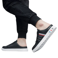 Black and white slip-on sneakers.