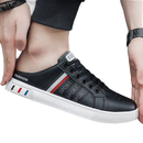 Black and white slip-on sneaker.