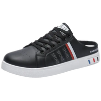 Black slip-on sneaker with white sole.