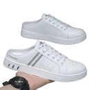 White slip-on sneakers.