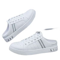 White slip-on sneakers.