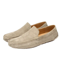 Beige suede loafers.