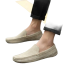 Beige suede loafers.