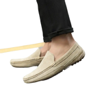 Beige suede moccasins.