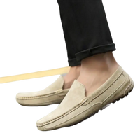 Beige suede moccasins.