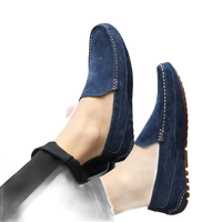 Blue suede driving shoes.