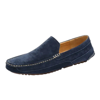 Blue suede loafer.