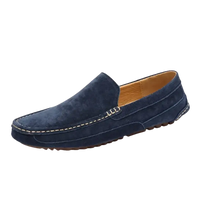 Blue suede loafer.