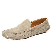 Beige suede loafer.