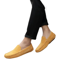 Mustard-colored suede loafers.