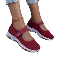 Burgundy Mary Jane sneakers.