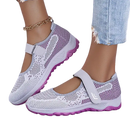 White and purple Mary Jane sneakers.