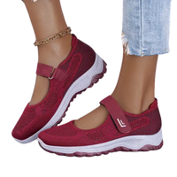 Burgundy Mary Jane sneakers.